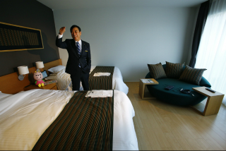 Illustration for article titled Behold, a Real Hotel Staffed By Talking Androids and Robotic Dinosaurs
